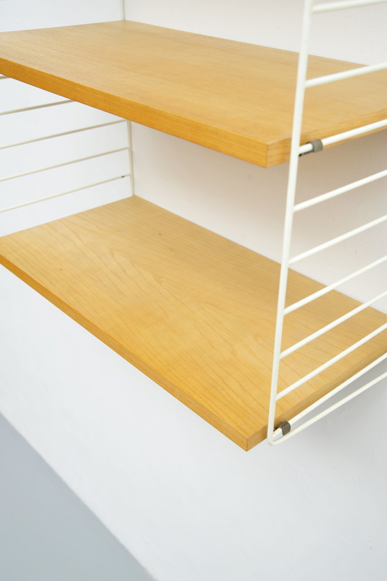 Image 1 of String shelving system in ash with 2 ladders by Kajsa and Nisse Strinning