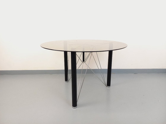 Image 1 of Vintage round dining table in smoked glass, black metal and chrome metal from the 80s