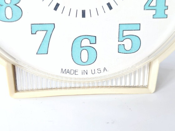 Image 1 of Vintage 1970s Westclox Alarm Clock | Cream and Turquoise, Made in USA