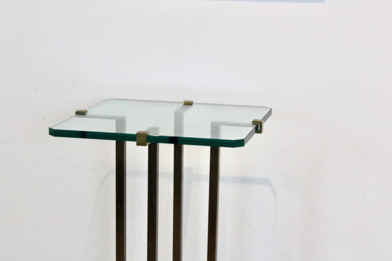 Table piédestal minimaliste en laiton et verre de Peter Ghyczy, Tables de salle à manger (photo 4 sur 12)