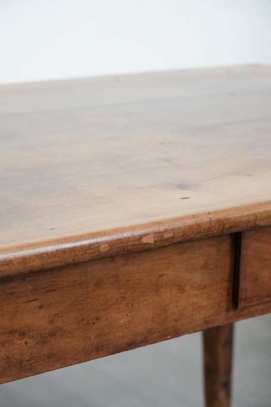 Image 1 of Early 19th century French fruitwood dining table with two drawers