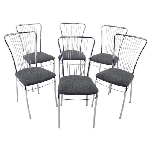 Set van zes Italiaanse eetkamerstoelen van chroom en bouclé, jaren 70.