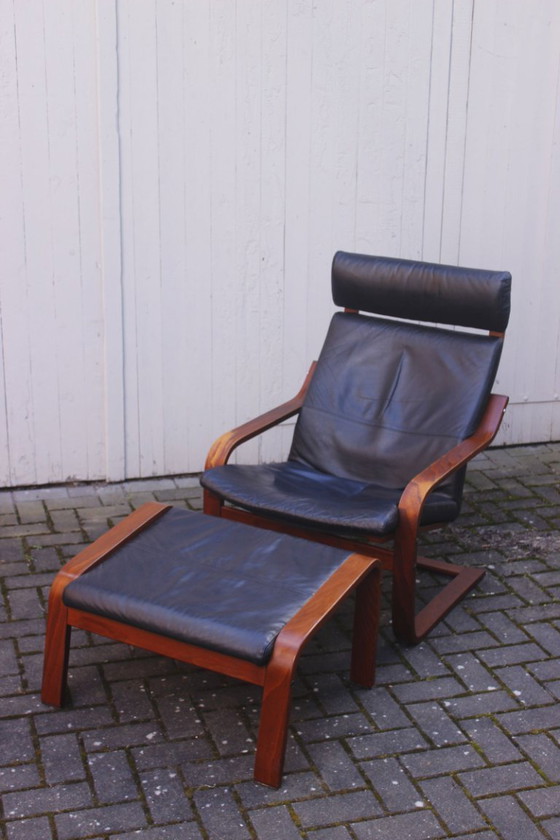 Image 1 of Ikea Vintage - Ikea POÄNG recliner and footstool in black leather, Scandinavian design, 1990s