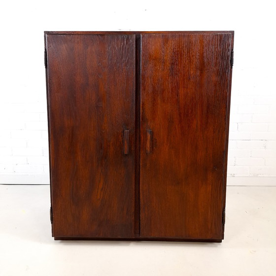 Image 1 of Vintage Art Deco style sideboard with rough dark brown wood
