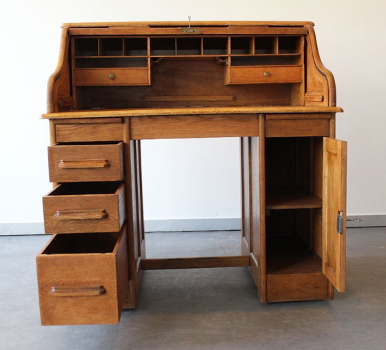 Image 1 of Amerikaans bureau van licht eikenhout, eind 19e eeuw.