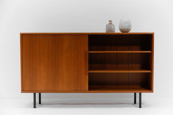 Image 1 of There is a small cosmetic flaw on the surface at the front left corner, see pictures