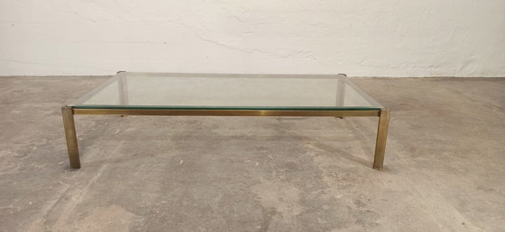 Image 1 of Vintage glass and brass coloured frame coffee table 