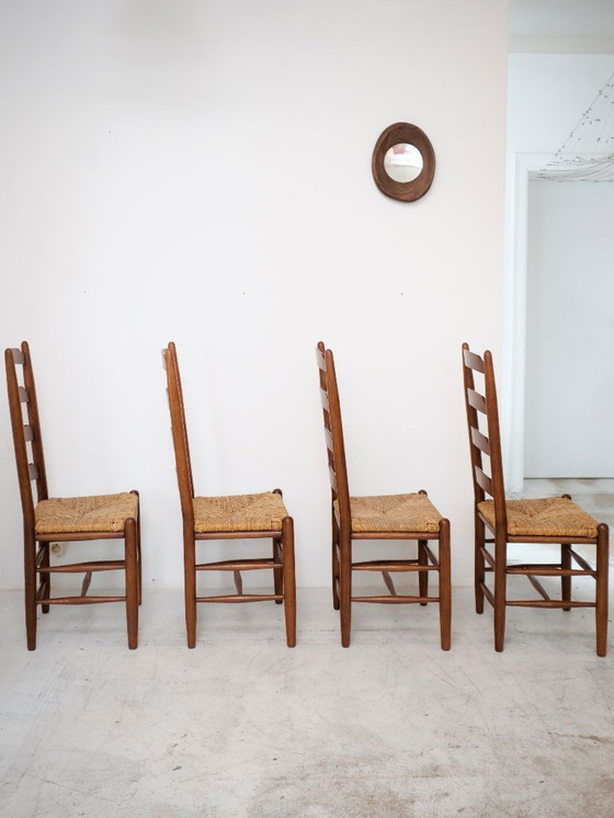 Image 1 of 4 timeless wooden and straw chairs