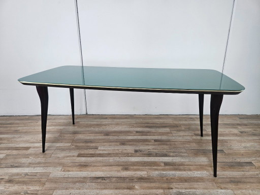 Mid-century mahogany dining table with aquamarine glass top