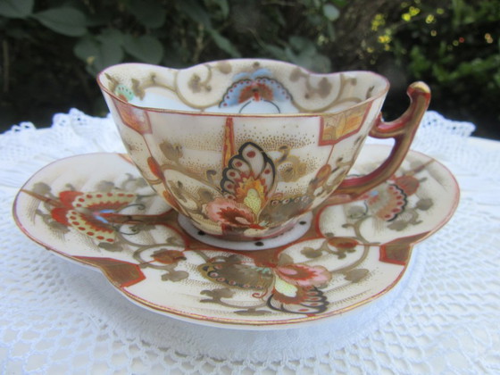 Image 1 of Tazza da tè e piattino orientali antichi, rossi e dorati, contrassegnati sul fondo.
