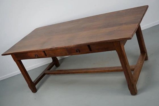 Image 1 of Early 20th-century French rustic country dining table made of oak and elm