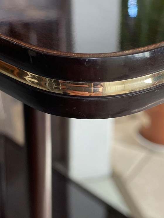 Image 1 of Meuble de télé à roulettes 2 plateaux formica marron 1960