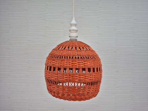 Polish vintage orange wicker lamp. Rattan pendant lamp.