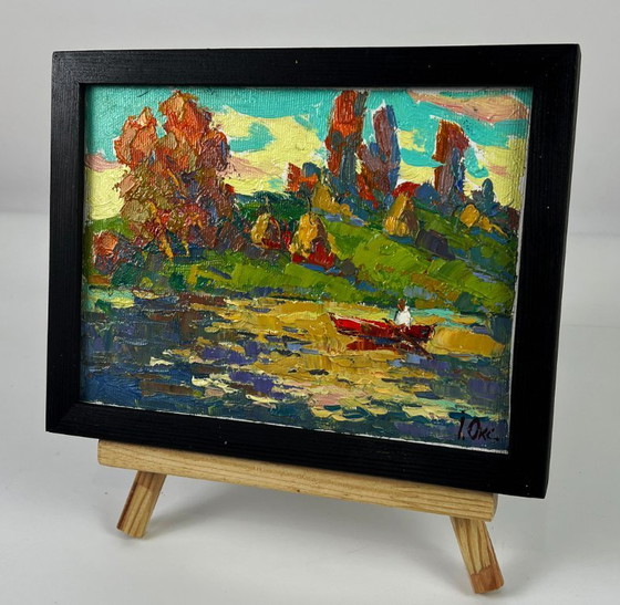 Image 1 of Peinture à l'huile originale représentant un paysage naturel, un bateau et un coucher de soleil se reflétant sur la rivière.