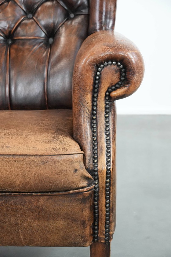 Image 1 of Unique large English-style sheepskin Chesterfield wing armchair