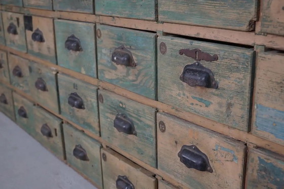 Image 1 of Gran armario industrial francés de madera de pino pintada para guardar artículos de ferretería, década de 1950