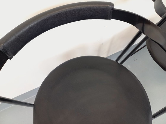 Image 1 of Set di 4 poltrone vintage di design italiano in metallo nero e similpelle nera degli anni '80