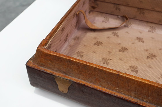 Image 1 of Vintage brown leather suitcase with copper details, China 1900s