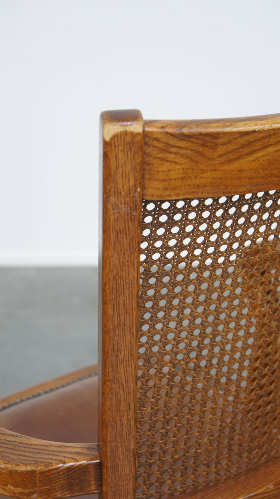 Image 1 of Cognac Colored Leather Office Chair on Wheels with Wood and a Wicker Matted Backrest