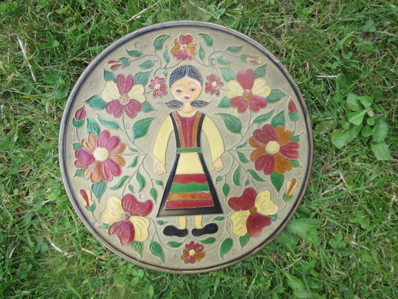 Image 1 of Mid century Enamelled Metal Folk Art Wall Plate - young girl and floral design - diam. 20 cm