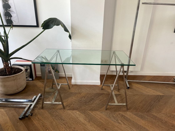 Image 1 of A MID - CENTURY MODERN TRESTLE TABLE (AFTER MILO BAUGHMAN)