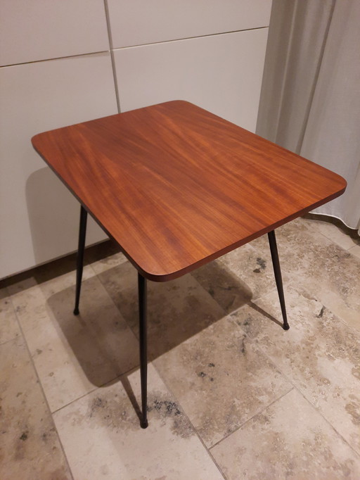 1970s table with rotating top.