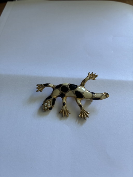 Spilla raffigurante una lucertola