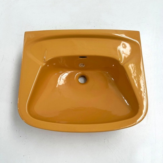 Image 1 of Vintage mosterdkleurige ronde spoelbak van Keramag Keravit, jaren 80.