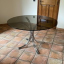 Tavolo Roche Bobois. 1970. Cromo e vetro fumé.