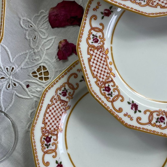 Image 1 of Antique Limoges porcelain dessert service by A. Lanternier & Cie, comprising 10 plates and a cake stand