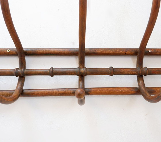 Image 1 of Wandkapstok van gebogen hout in Thonet-stijl – begin 20e eeuw
