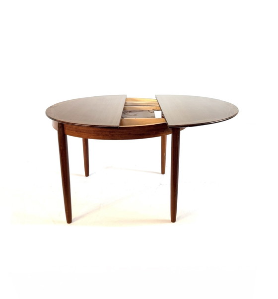 Image 1 of Vintage Rosewood extendable dining table '60