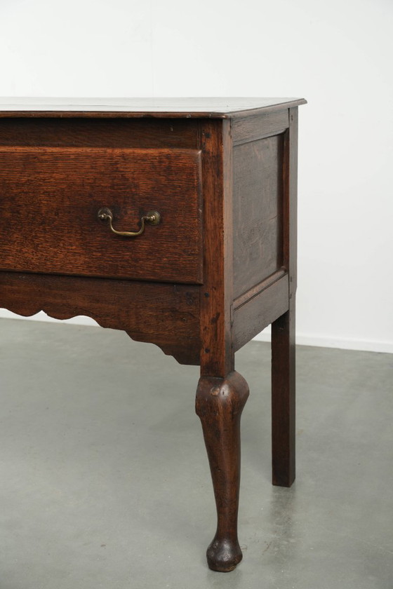Image 1 of Beautifully sized antique 18th-century English oak dresser/sideboard with brass handles and beautiful colors.
