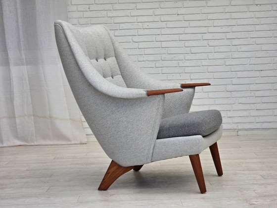 Image 1 of 1970er Jahre, dänischer Sessel mit hoher Rückenlehne und Hocker, Wolle, Teakholz.