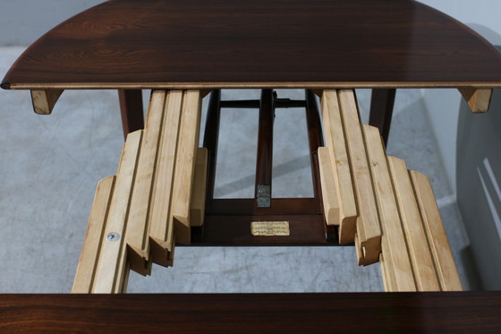 Image 1 of Table de salle à manger extensible en bois de rose par Henning Kjaernulf