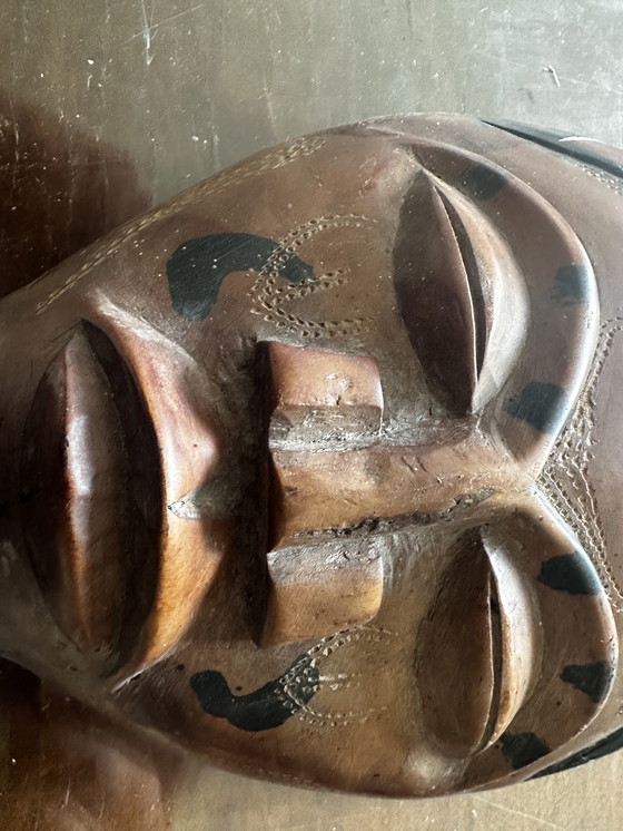 Image 1 of Petit masque Africain en bois sculpté début XX e siècle