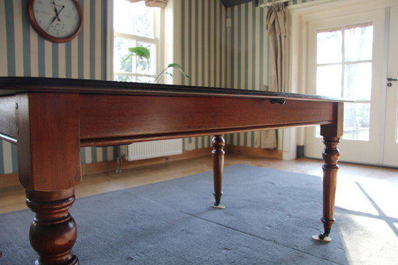 Image 1 of Victorian mahogany folding dining table by Eichholtz