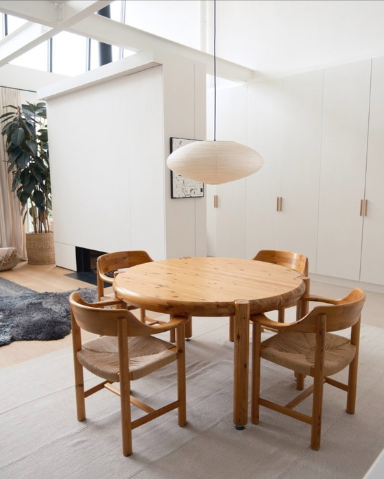 Image 1 of Rainer Daumiller. Uitschuifbare ronde tafel met 6 stoelen.