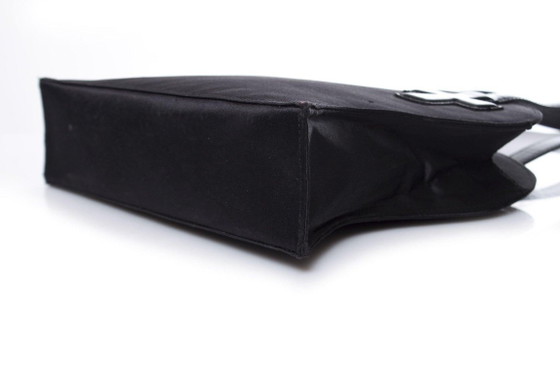 Image 1 of Borsa Christian Lacroix in seta e pelle verniciata.