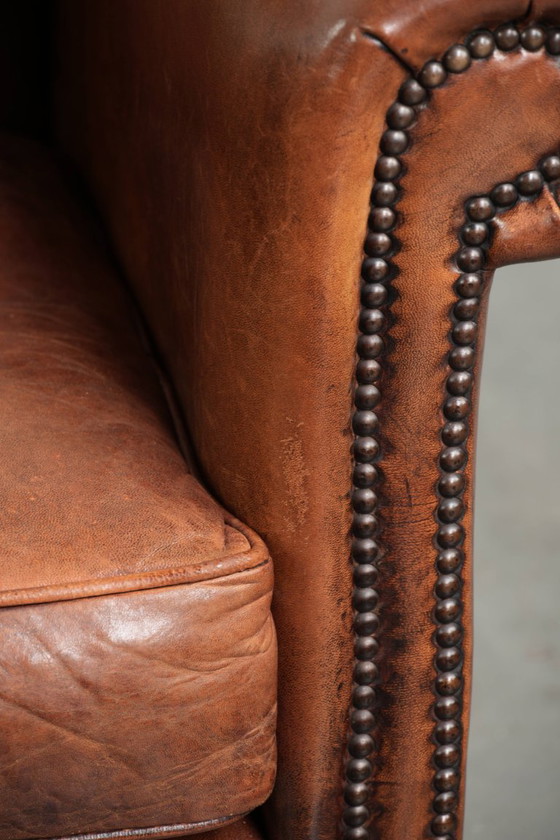 Vintage schapenleren armchair met een comfortabele zit en afgewerkt met siernagels – Fauteuils, Leather (photo 11 of 14)