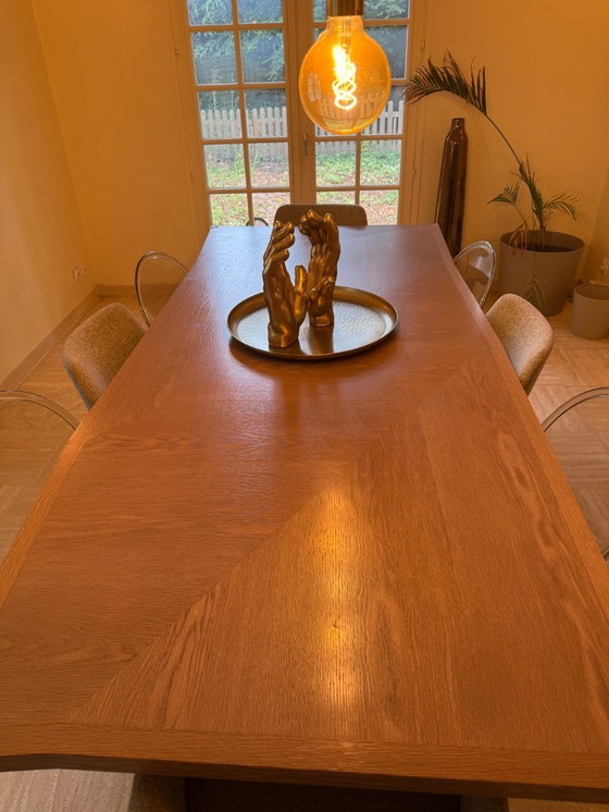 Image 1 of roche bobois dining table and 8 roche bobois chairs