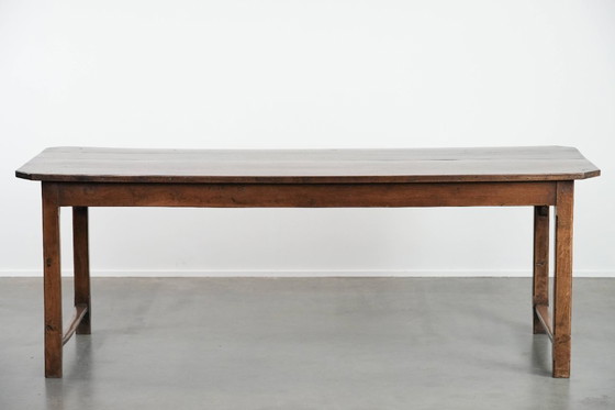 Image 1 of Antieke Franse eettafel voor 4 tot 6 personen uit eind 18e/ begin 19e eeuw met een eiken blad en een brood/ uittrek plank