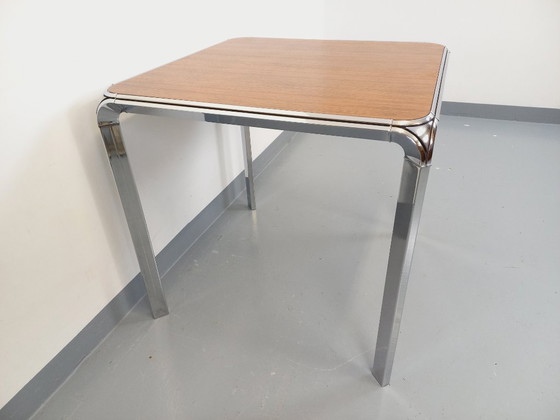 Image 1 of Tavolo da pranzo quadrato vintage Pierre Paulin in palissandro e metallo cromato degli anni '70