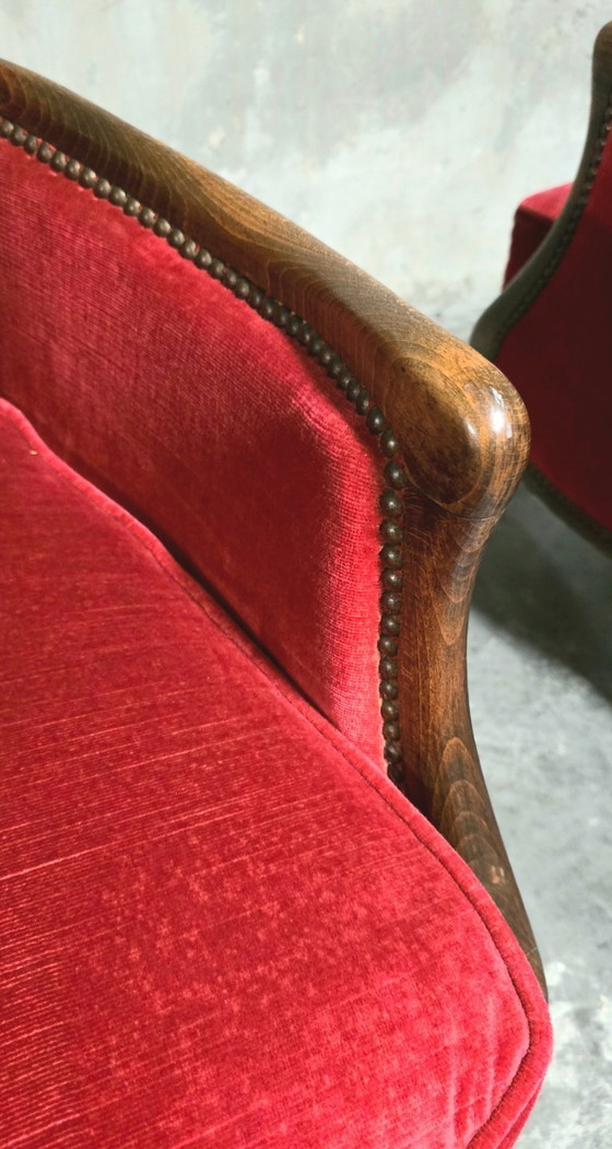 Image 1 of Par de sillones bergère estilo Luis XV en terciopelo rojo.