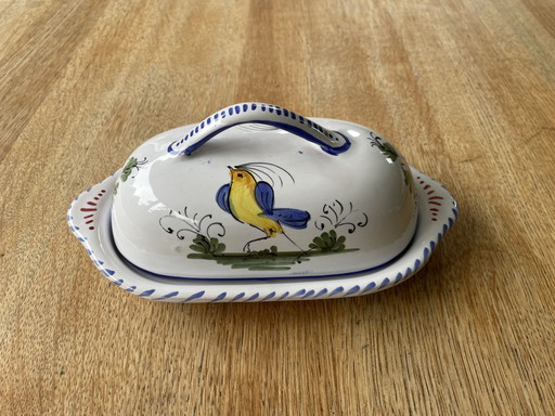 Handbeschilderde botervloot met vogelmotief
