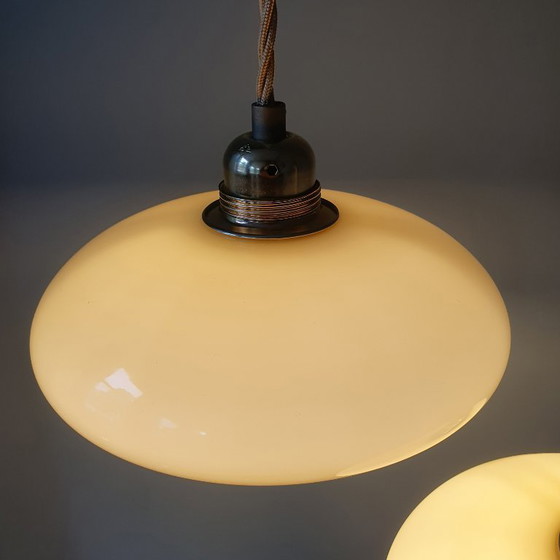 Image 1 of Vintage French pendant lamp set - of pastel yellow opaline glass.