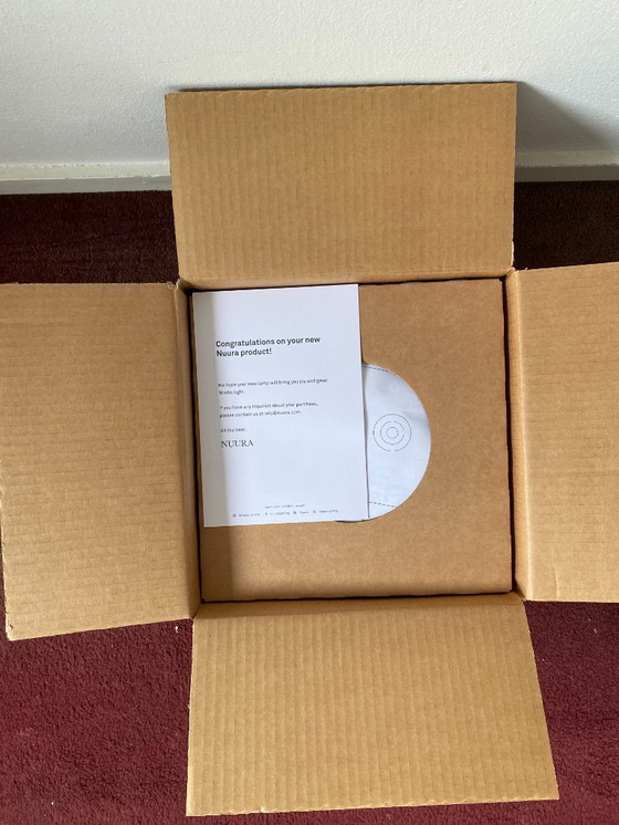 Image 1 of NUURA BLOSSI WANDLAMP Ø23, NORDIC GOLD / TRANSPARANT (In doos en ongebruikt)