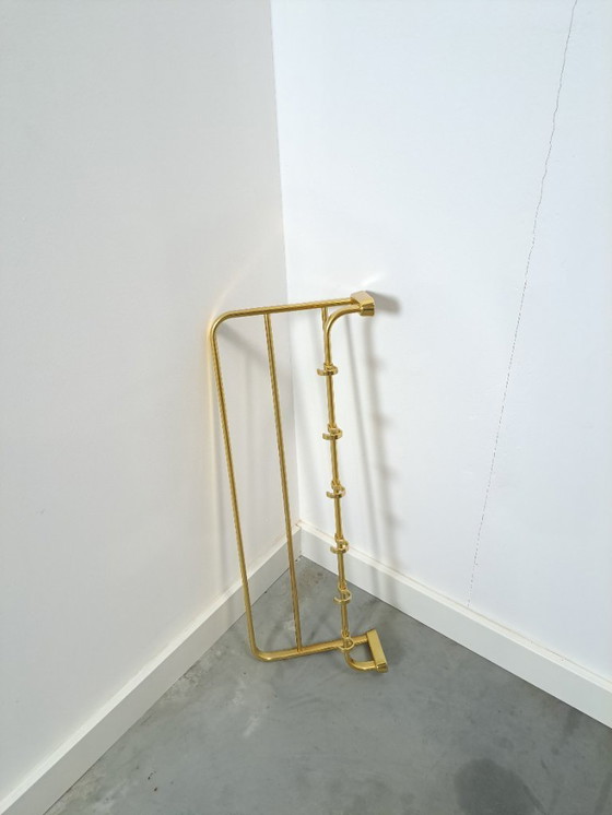 Image 1 of Porte-manteau en forme de train, couleur or, avec crochets, n° 18