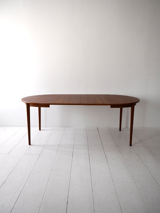 Image 1 of 1960s Scandinavian Round Teak Dining Table with Two Leaves