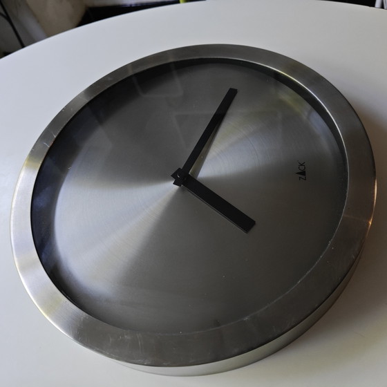 Image 1 of Minimalist wall clock by Zack in brushed stainless steel.